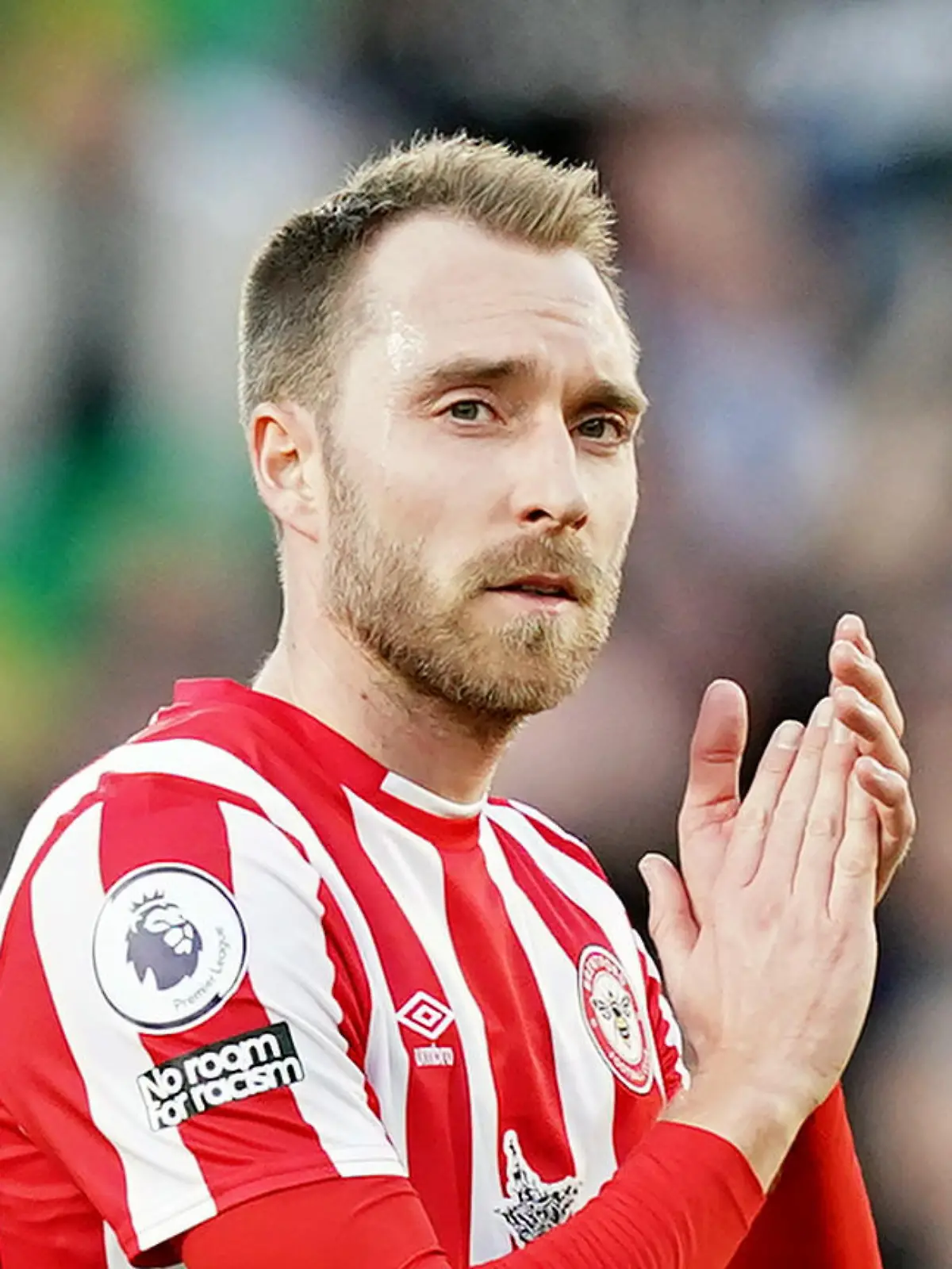 Brentford v Newcastle United - Premier League - Brentford Community Stadium. Brentford's Christian Eriksen applauds the fans after the final whistle of the Premier League match at the Brentford Community Stadium, London. Picture date: Saturday February 26, 2022. See PA story SOCCER Brentford. Photo credit should read: Aaron Chown/PA Wire. RESTRICTIONS: EDITORIAL USE ONLY No use with unauthorised audio, video, data, fixture lists, club/league logos or "live" services. Online in-match use limited to 120 images, no video emulation. No use in betting, games or single club/league/player publications. URN:65550510