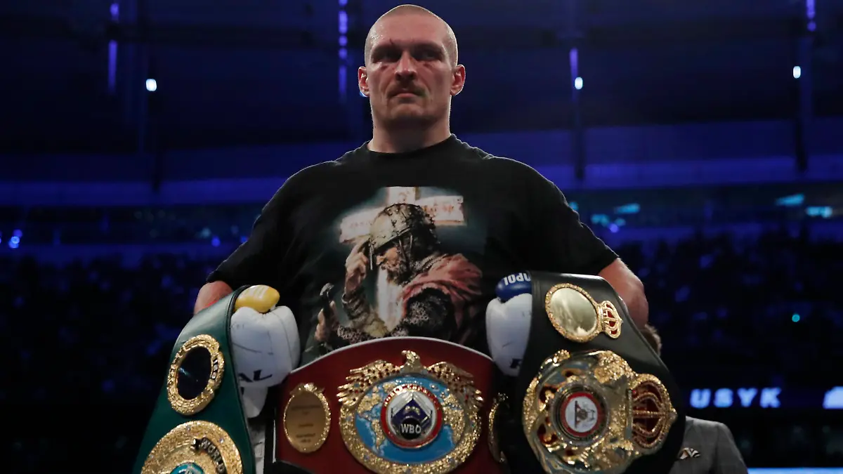 Boxing - WBA, IBF & WBO Heavyweight Titles - Anthony Joshua v Oleksandr Usyk - Tottenham Hotspur Stadium, London, Britain - September 25, 2021 Oleksandr Usyk celebrates winning his fight against Anthony Joshua Action Images via Reuters/Andrew Couldridge