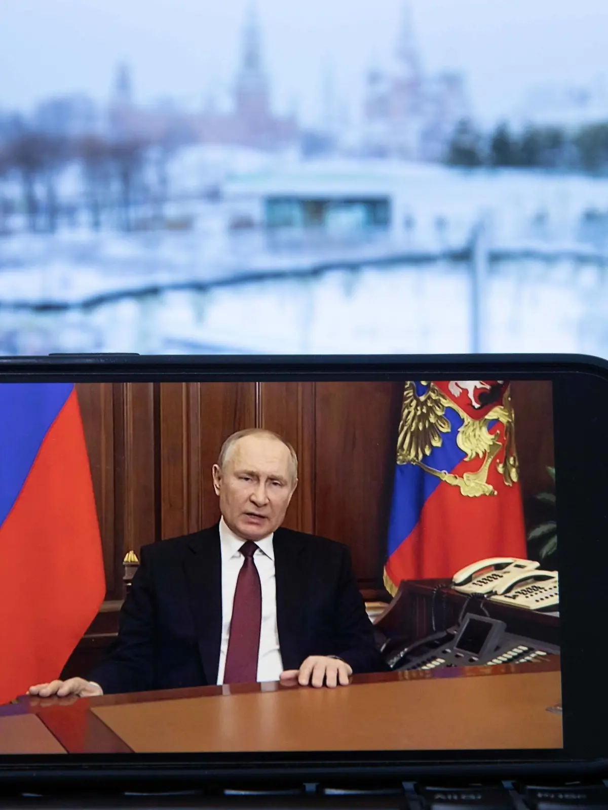  220224 -- MOSCOW, Feb. 24, 2022 -- Photo taken on Feb. 24, 2022 shows a screen displaying Russian President Vladimir Putin speaking during a televised address, in Moscow, Russia. TO GO WITH Putin authorizes special military operation in Donbass region  RUSSIA-MOSCOW-PUTIN-TELEVISED ADDRESS BaixXueqi PUBLICATIONxNOTxINxCHN