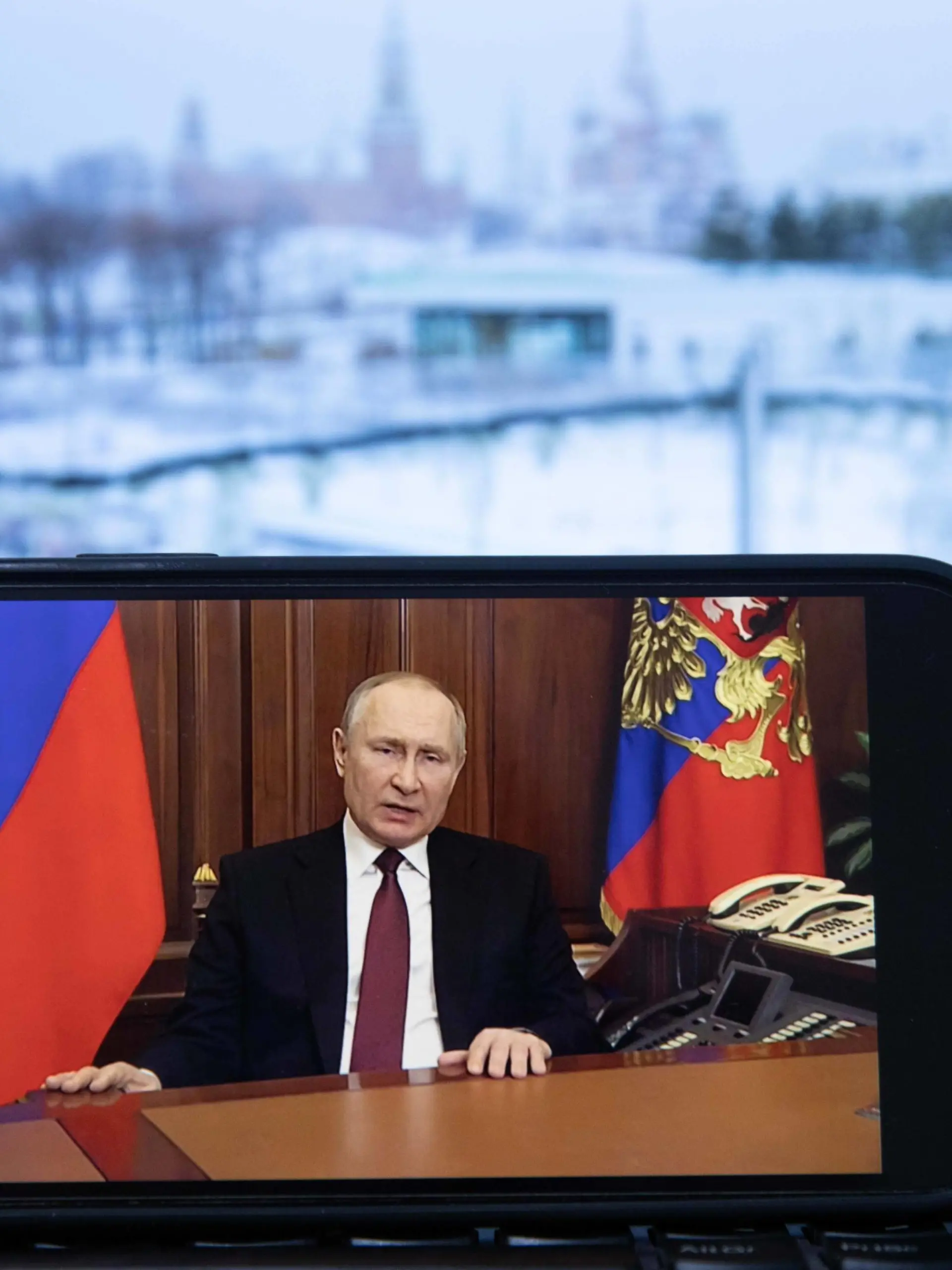  220224 -- MOSCOW, Feb. 24, 2022 -- Photo taken on Feb. 24, 2022 shows a screen displaying Russian President Vladimir Putin speaking during a televised address, in Moscow, Russia. TO GO WITH Putin authorizes special military operation in Donbass region  RUSSIA-MOSCOW-PUTIN-TELEVISED ADDRESS BaixXueqi PUBLICATIONxNOTxINxCHN