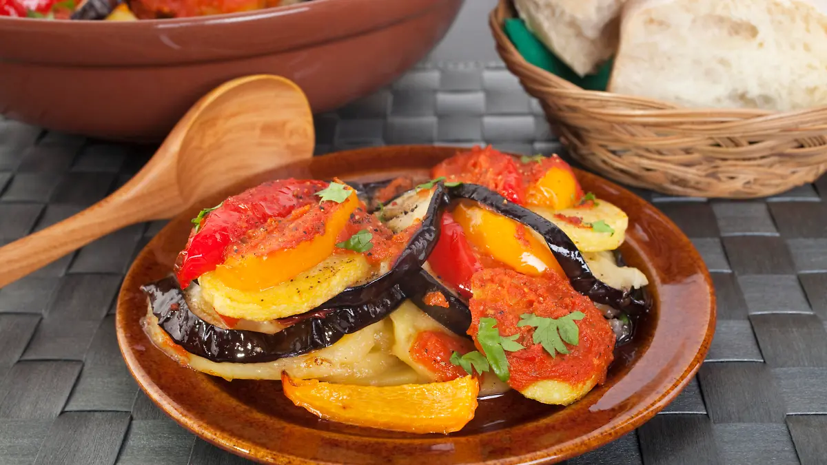 "This dish is very popular in the Spanish island of Majorca, it's a vegetarian casserole of fried potatoes, aubergines and pimentoes, baked in the oven with tomato sauce."