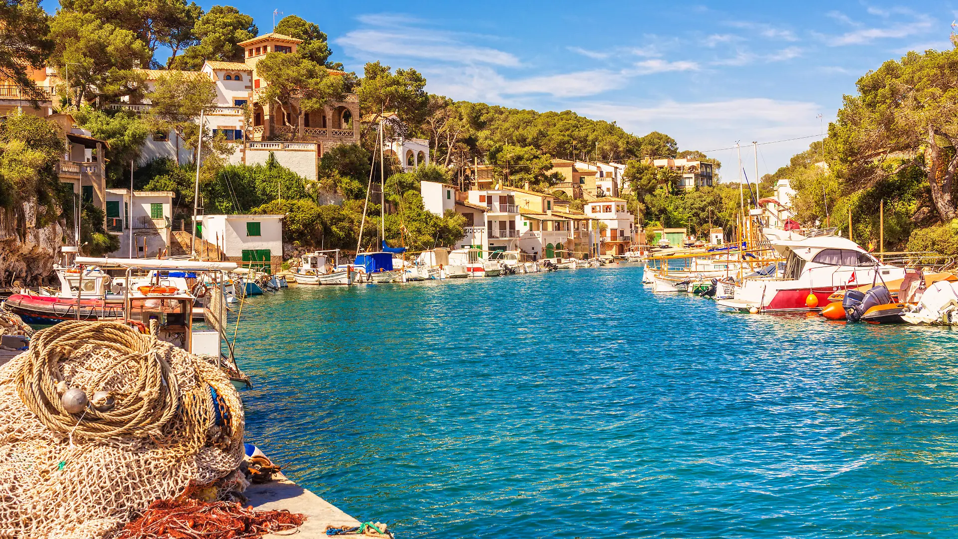 Fishing boats and nets in Cala Figuera, a small traditional fishing village located in the district of Santanyí on the Balearic Islands of Mallorca (Spain).
