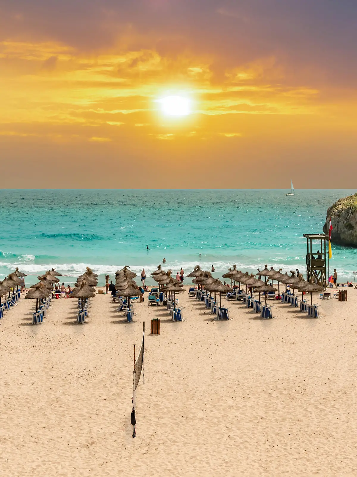 Beautiful vibrant sunrise on the paradise beach on Cala Domingos playa de Mallorca in the summer holiday, Spain