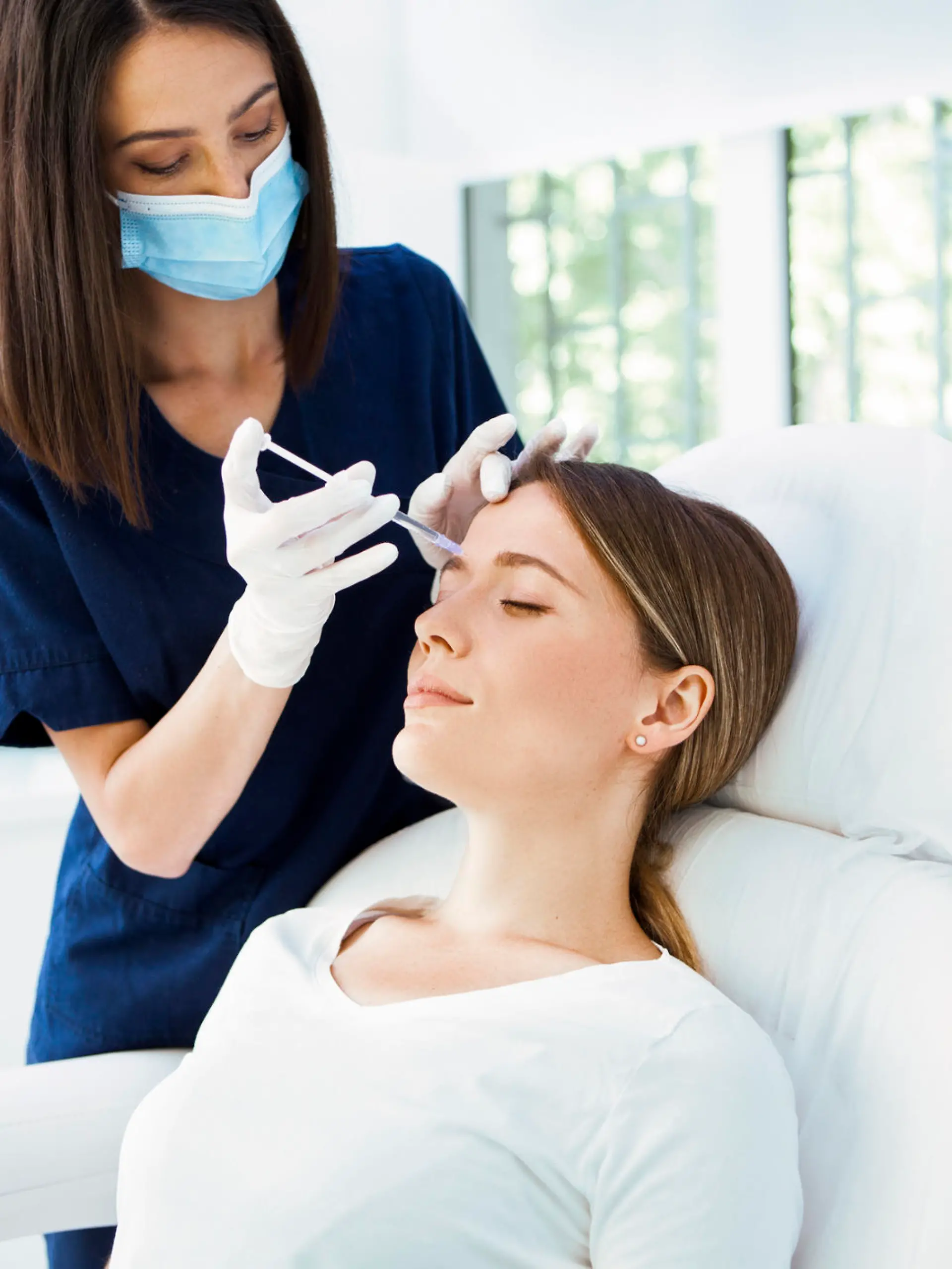 Woman receiving botox injection