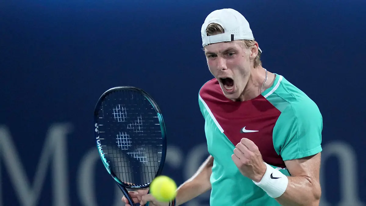 Denis Shapovalov of Canada celebrates a point win over Hungary's Marton Fucsovics during a match at the Dubai Duty Free Tennis Championship in Dubai, United Arab Emirates, Tuesday, Feb. 22, 2022.(AP Photo/Ebrahim Noroozi)