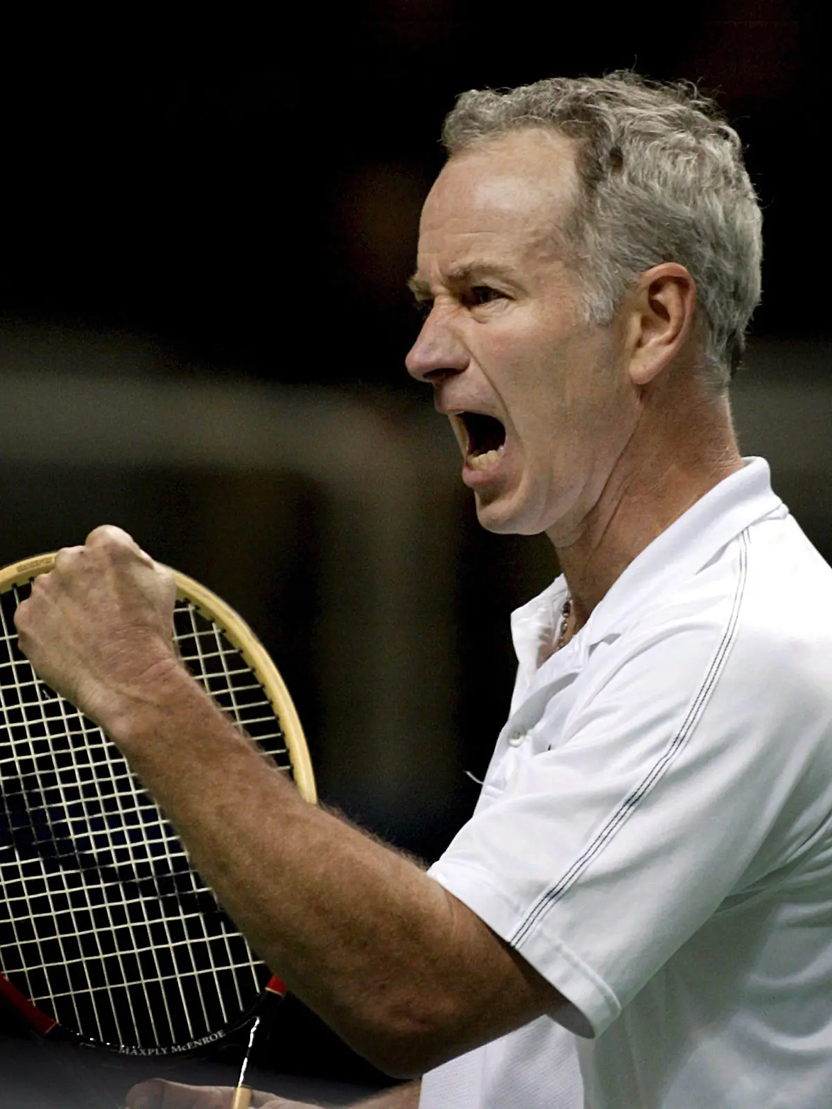 American John McEnroe doubling with Sweden's Jonas Bjorkman (not pictured) celebrates a strong play against American doubles duo Paul Goldstein and Jim Thomas at the finals for the SAP Open tennis tournament at HP Pavillion in San Jose, California Sunday, 19 February 2006. McEnroe and Bjorkman beat Goldstein and Thomas 7-6, 4-6 with a 10-7 tie breaker. EPA/ARLEEN NG +++(c) dpa - Bildfunk+++
