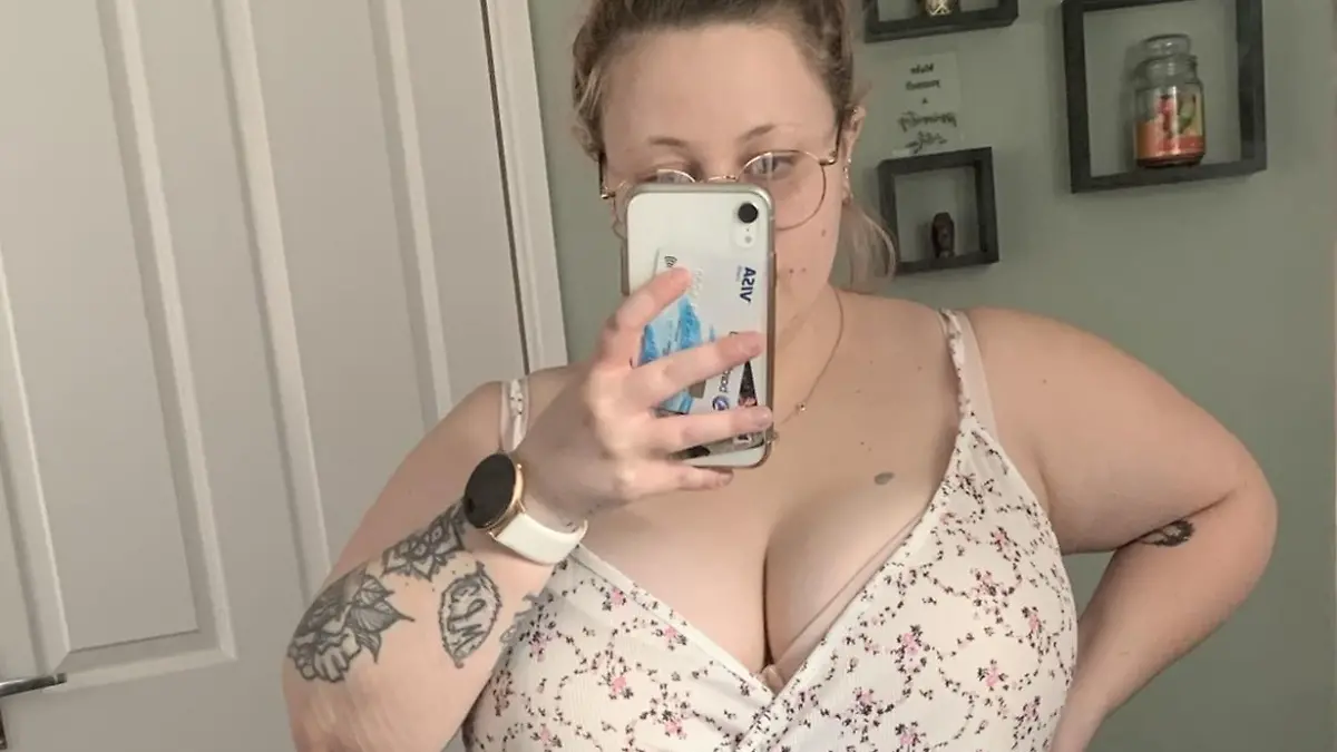 PIC FROM Kennedy News and Media (PICTURED: KELLY STAPLES (23) FROM FRADDON, CORNWALL, A SIZE 40GH IN MARCH 2021) A mum claims her 40H breasts are so big they rest on her throat and STRANGLE her when she lies down - but is being forced to raise £7,000 for reduction surgery as funding 'isn't available on the NHS'. Kelly Staples was just 13 and a size 34F when she first approached her GP in 2012 about a breast reduction but says she was told she was 'overweight' and advised to shed a few pounds. The 23-year-old said she lost three stone hoping her boobs would shrink, but sadly the weight lost didn't drop off her chest. DISCLAIMER: While Kennedy News and Media uses its best endeavours to establish the copyright and authenticity of all pictures supplied, it accepts no liability for any damage, loss or legal action caused by the use of images supplied and the publication of images is solely at your discretion. SEE KENNEDY NEWS COPY - 0161 697 4266