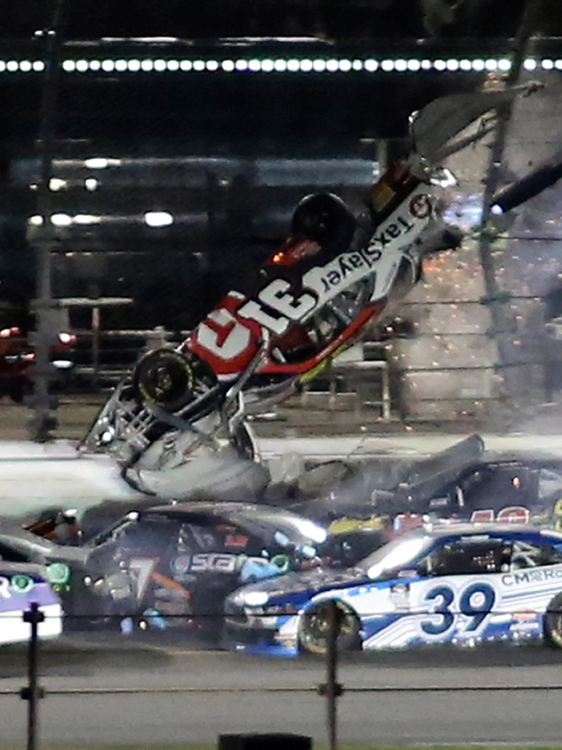 Myatt Snider goes airborne as he crashes on the final lap during the NASCAR Xfinity Series auto race Saturday, Feb. 19, 2022, at Daytona International Speedway in Daytona Beach, Fla. (AP Photo/Jim Topper)