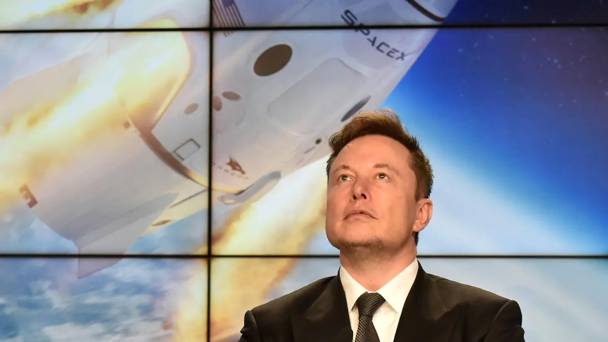 FILE PHOTO: SpaceX founder and chief engineer Elon Musk attends a post-launch news conference to discuss the SpaceX Crew Dragon astronaut capsule in-flight abort test at the Kennedy Space Center in Cape Canaveral, Florida, U.S. January 19, 2020. REUTERS/Steve Nesius/File Photo