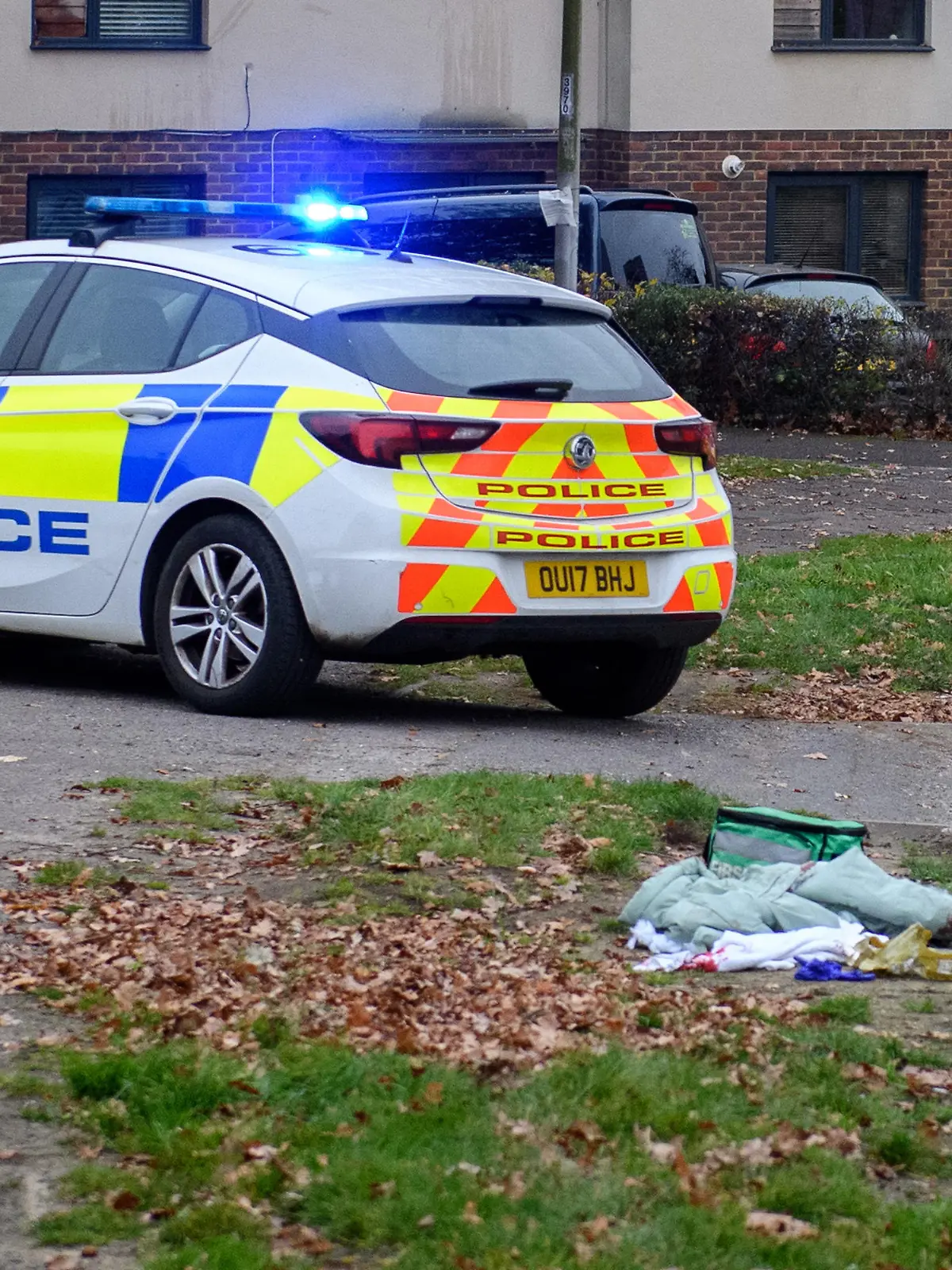 November 24, 2021, Reading, Berkshire, UK: Reading, UK. Medical kits and police vehicles at the scene following a stabbing on Wensley Road in Coley Park, Reading. An 18-year-old woman suffered stab wounds and was attended to by South Central Ambulance Service and Thames Valley Air Ambulance at approximately 14:05GMT and was taken to hospital. One man has been arrested in connection with this incident. It is thought that victim and her attacker are known to each other. (Credit Image: Â© Peter Manning/London News Pictures via ZUMA Press Wire