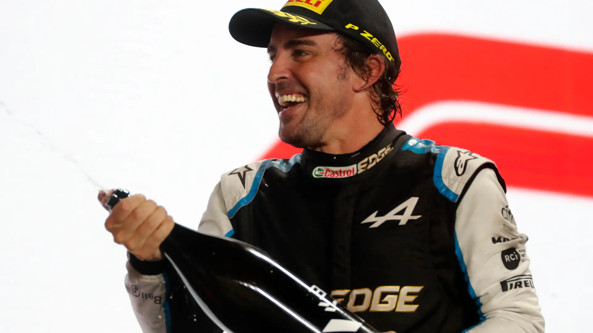Formula 1 2021: Qatar GP LOSAIL INTERNATIONAL CIRCUIT, QATAR - NOVEMBER 21: Fernando Alonso, Alpine F1, 3rd position, sprays Rose Water on the podium during the Qatar GP at Losail International Circuit on Sunday November 21, 2021 in Losail, Qatar. Photo by Steven Tee / LAT Images Images PUBLICATIONxINxGERxSUIxAUTxHUNxONLY GP2120_164343_2ST2383