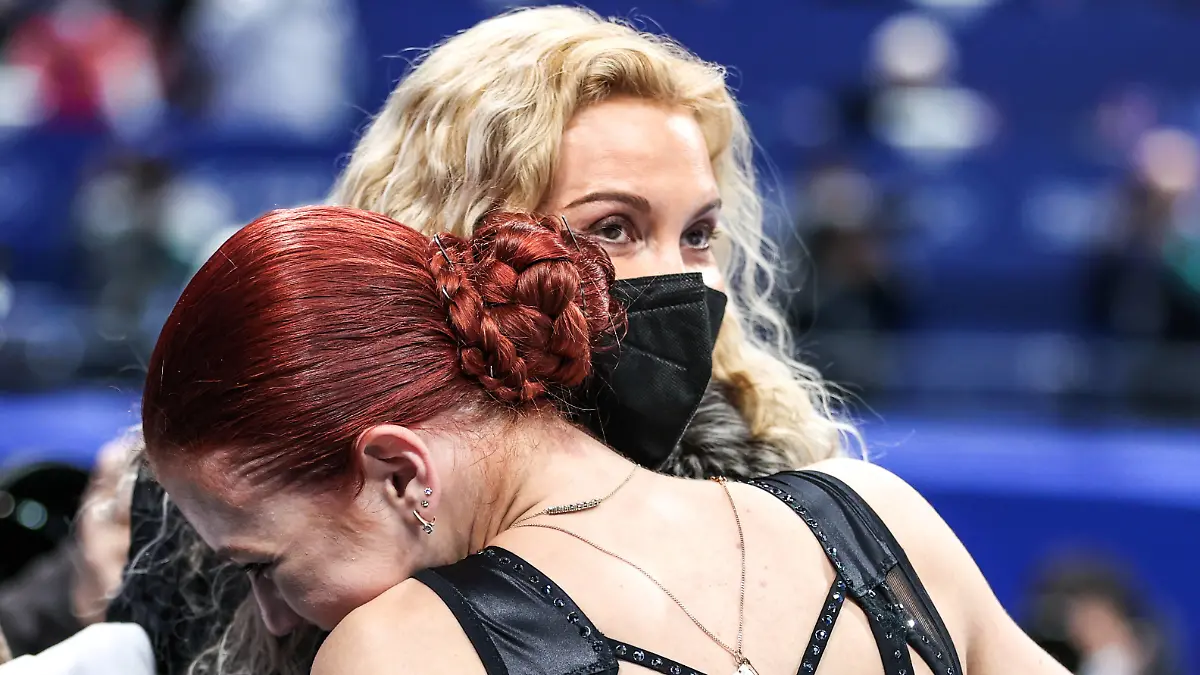 BEIJING, CHINA - FEBRUARY 17, 2022: Figure skater Alexandra Trusova front and coach Eteri Tutberidze of Team ROC are seen after Trusova s performance in the women s free skating programme at the Capital Indoor Stadium at the 2022 Winter Olympic Games, Olympische Spiele, Olympia, OS Trusova took silver. Trusova has become the first female figure skater in history to perform five quads in a skating programme. Sergei Bobylev/TASS PUBLICATIONxINxGERxAUTxONLY TS123E33