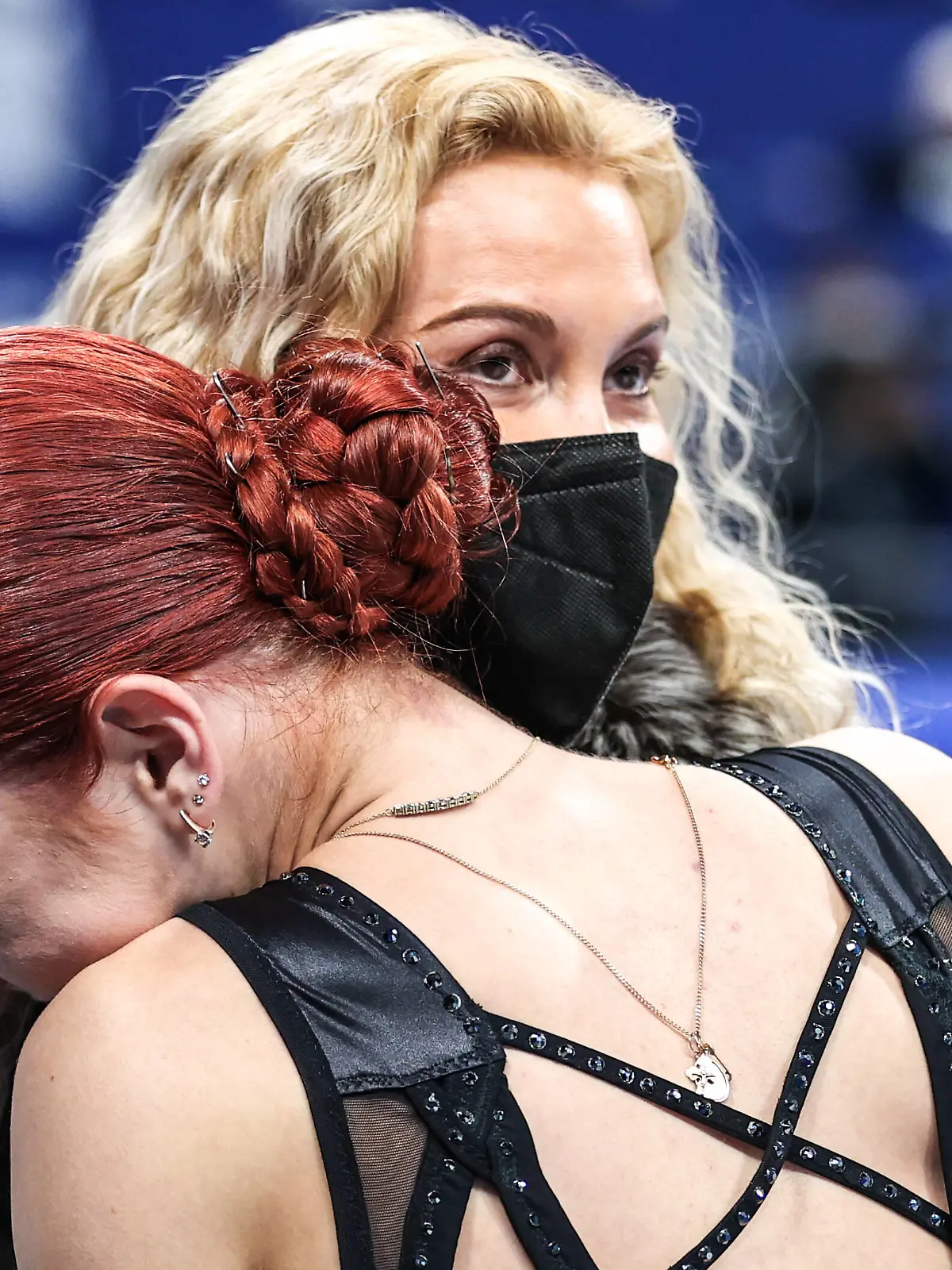 BEIJING, CHINA - FEBRUARY 17, 2022: Figure skater Alexandra Trusova front and coach Eteri Tutberidze of Team ROC are seen after Trusova s performance in the women s free skating programme at the Capital Indoor Stadium at the 2022 Winter Olympic Games, Olympische Spiele, Olympia, OS Trusova took silver. Trusova has become the first female figure skater in history to perform five quads in a skating programme. Sergei Bobylev/TASS PUBLICATIONxINxGERxAUTxONLY TS123E33 