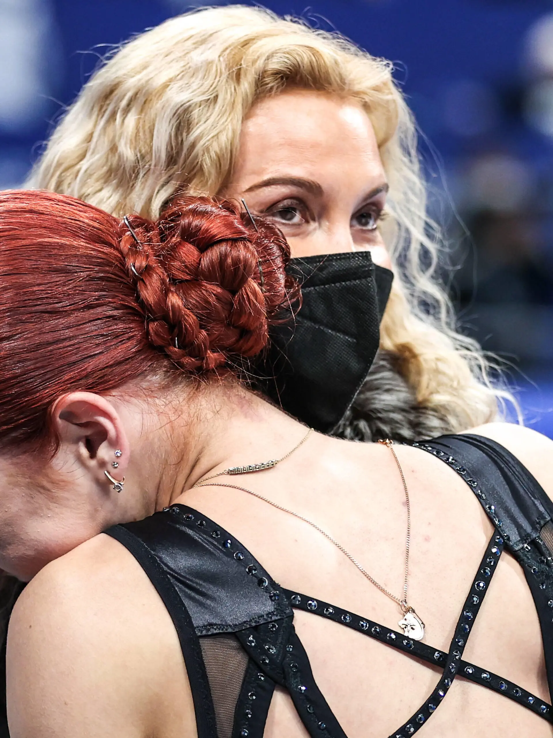 BEIJING, CHINA - FEBRUARY 17, 2022: Figure skater Alexandra Trusova front and coach Eteri Tutberidze of Team ROC are seen after Trusova s performance in the women s free skating programme at the Capital Indoor Stadium at the 2022 Winter Olympic Games, Olympische Spiele, Olympia, OS Trusova took silver. Trusova has become the first female figure skater in history to perform five quads in a skating programme. Sergei Bobylev/TASS PUBLICATIONxINxGERxAUTxONLY TS123E33 