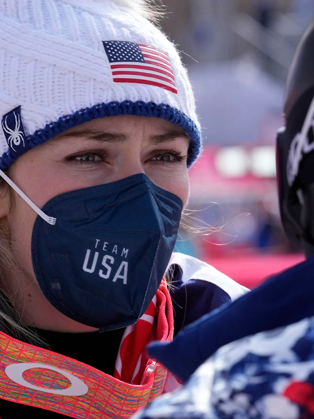 Mikaela Shiffrin of United States stands in the finish area after completing the women's super-G at the 2022 Winter Olympics, Friday, Feb. 11, 2022, in the Yanqing district of Beijing. (AP Photo/Robert F. Bukaty)