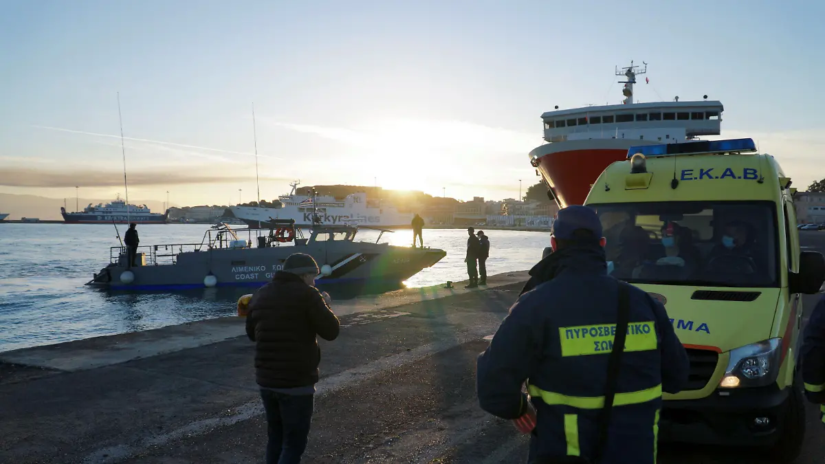 A Greek coast guard vessel carrying a passenger from Italian-flagged Euroferry Olympia that caught fire off the island of Corfu, approaches the port on Corfu, Greece, February 18, 2022. REUTERS/Adonis Skordilis