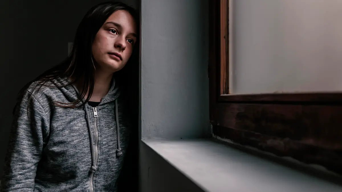 Sad and contemplative young woman.