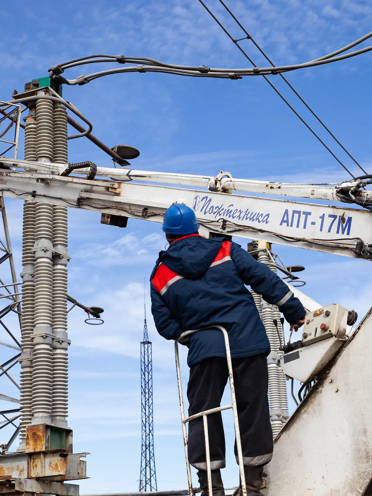 LUGANSK REGION, UKRAINE - OCTOBER 9, 2021: Employees of Luganskiye Elektricheskiye Seti [Lugansk Electrical Services] carry out routine maintenance of a high-voltage power transmission line running from Russia to the Lugansk People's Republic, at the Pobeda [Victory] electrical substation. Alexander Reka/TASS