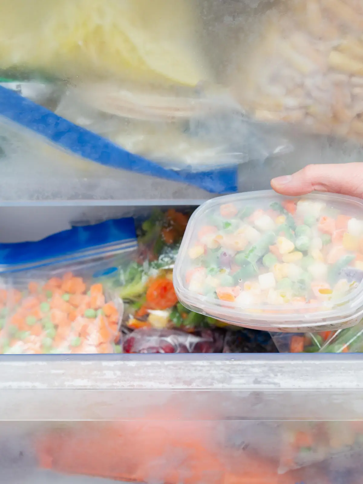 Frozen vegetables in a plastic bag. Healthy food storage concept.