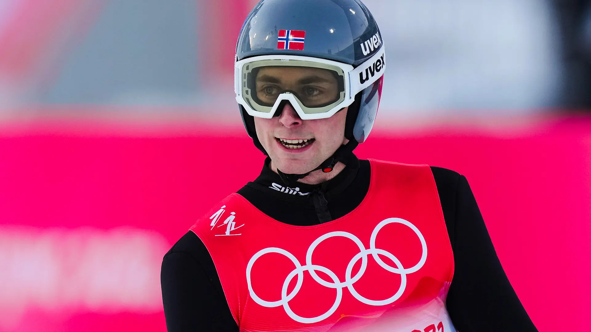 Jarl Magnus Riiber, of Norway, reacts after his jump during the competition round of the individual Gundersen large hill/10km, ski jumping competition at the 2022 Winter Olympics, Tuesday, Feb. 15, 2022, in Zhangjiakou, China. (AP Photo/Matthias Schrader)
