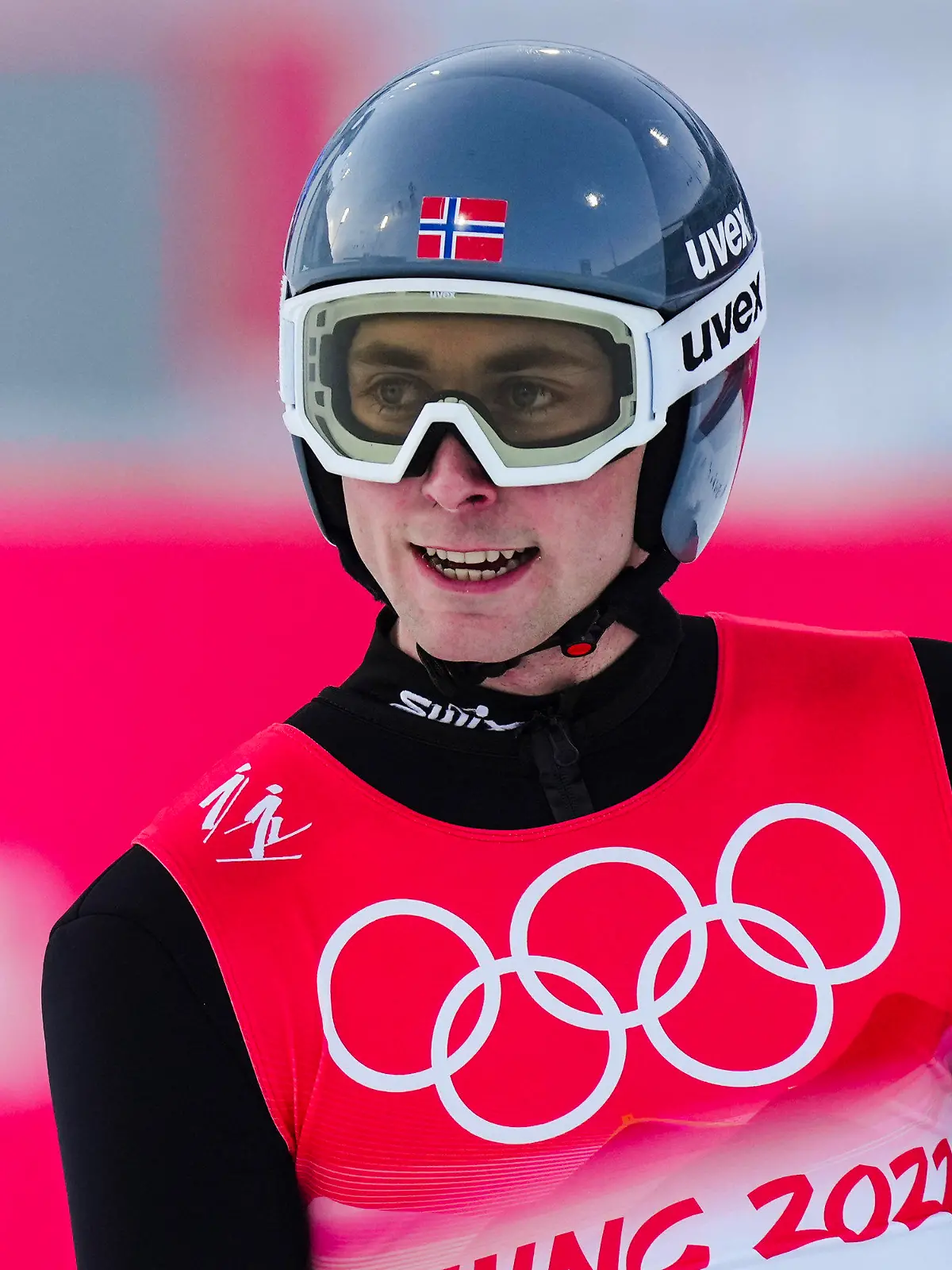 Jarl Magnus Riiber, of Norway, reacts after his jump during the competition round of the individual Gundersen large hill/10km, ski jumping competition at the 2022 Winter Olympics, Tuesday, Feb. 15, 2022, in Zhangjiakou, China. (AP Photo/Matthias Schrader)
