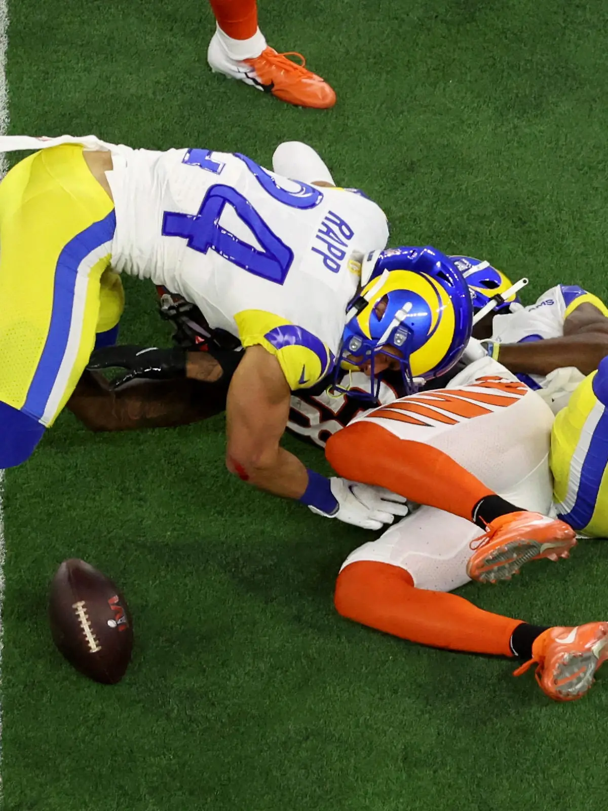 American Football  - NFL - Super Bowl LVI - Cincinnati Bengals v Los Angeles Rams - SoFi Stadium, Inglewood, California, United States - February 13, 2022 Cincinnati Bengals' Tee Higgins in action with Los Angeles Rams' Taylor Rapp REUTERS/Mario Anzuoni