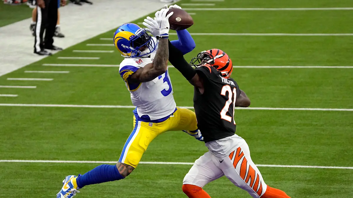 Los Angeles Rams wide receiver Odell Beckham Jr. (3) pulls in a touchdown pass as Cincinnati Bengals cornerback Mike Hilton (21) defends during the first half of the NFL Super Bowl 56 football game Sunday, Feb. 13, 2022, in Inglewood, Calif. (AP Photo/Tony Gutierrez)