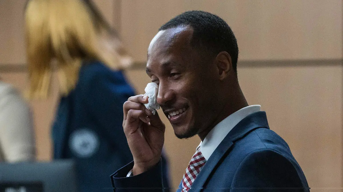 Former Florida State football player Travis Rudolph reacts after a jury acquitted him of all charges in a fatal shooting in 2021, Wednesday, June 7, 2023, in the Palm Beach County Courthouse in downtown West Palm Beach, Fla. (Andres Leiva/The Palm Beach Post via AP, Pool)