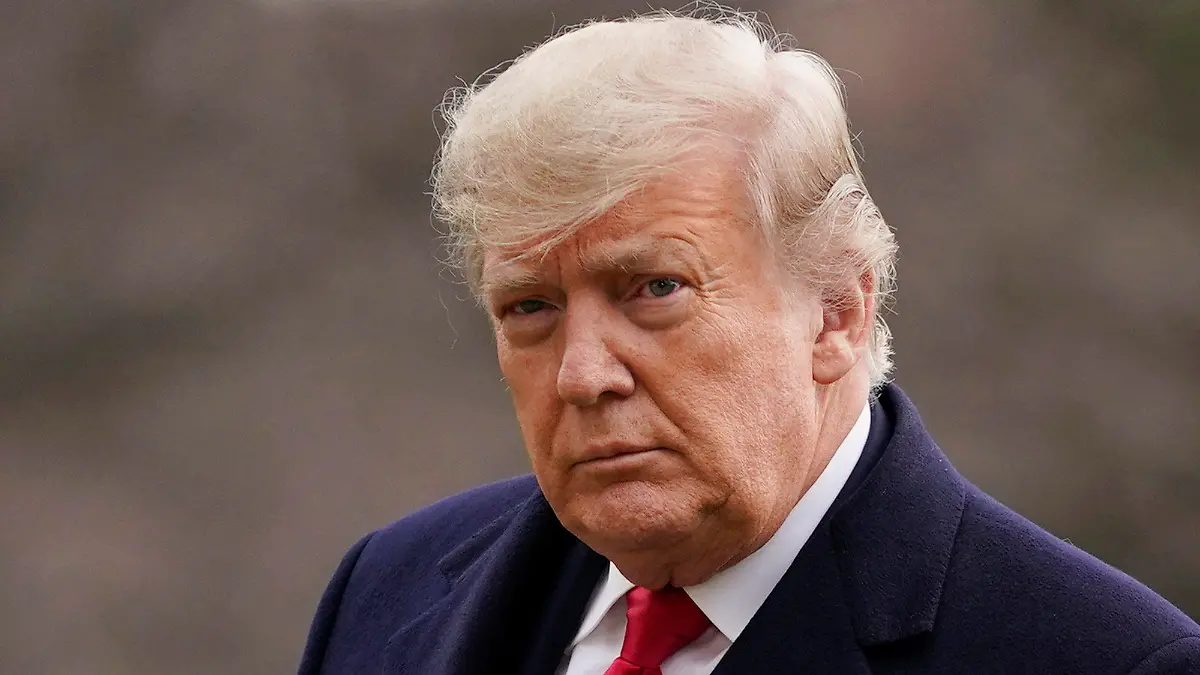 ARCHIV - 31.12.2020, USA, Washington: Donald Trump, damaliger Präsident der USA, kommt auf dem Südrasen des Weißen Hauses in Washington an. (zu dpa «Trump kassiert Niederlage im Streit um Herausgabe von Dokumenten») Foto: Evan Vucci/AP/dpa +++ dpa-Bildfunk +++