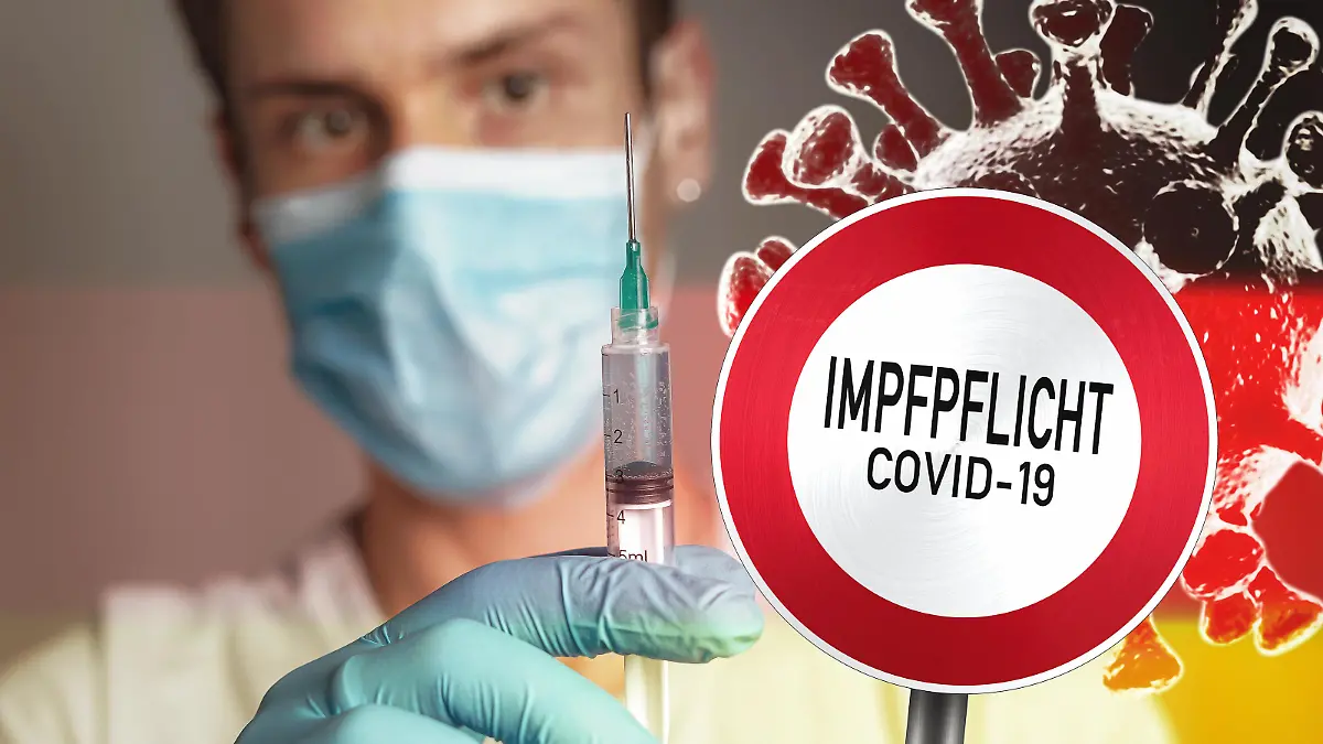 Coronavirus Impfpflicht - Schild mit der Aufschrift Impfpflicht, Allgemeine Impfpflicht in Deutschland Symbolbild || Modellfreigabe vorhanden