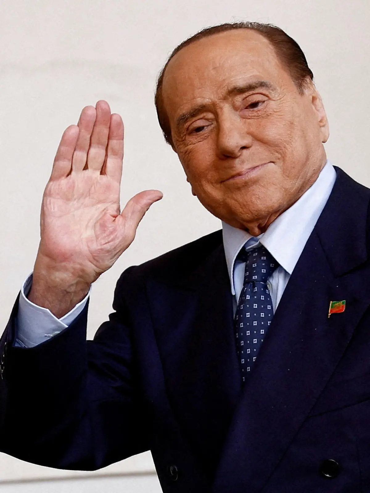 FILE PHOTO: Forza Italia leader and former Prime Minister Silvio Berlusconi arrives for a meeting with Italian President Sergio Mattarella at the Quirinale Palace in Rome, Italy October 21, 2022. REUTERS/Guglielmo Mangiapane/File Photo