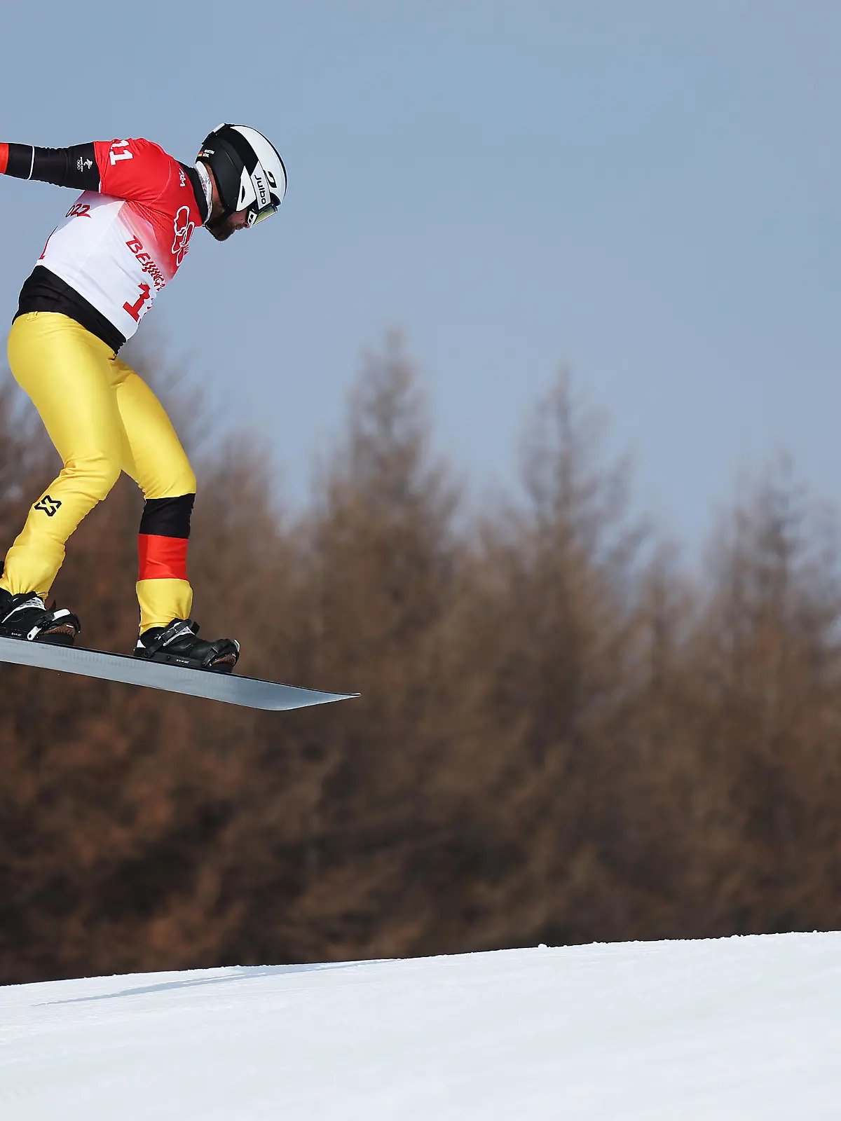 ZHANGJIAKOU, CHINA - FEBRUARY 10: Martin Noerl of Team Germany competes during the Men's Snowboard Cross Qualification on Day 6 of the Beijing 2022 Winter Olympics at Genting Snow Park on February 10, 2022 in Zhangjiakou, China. (Photo by Lars Baron/Getty Images)