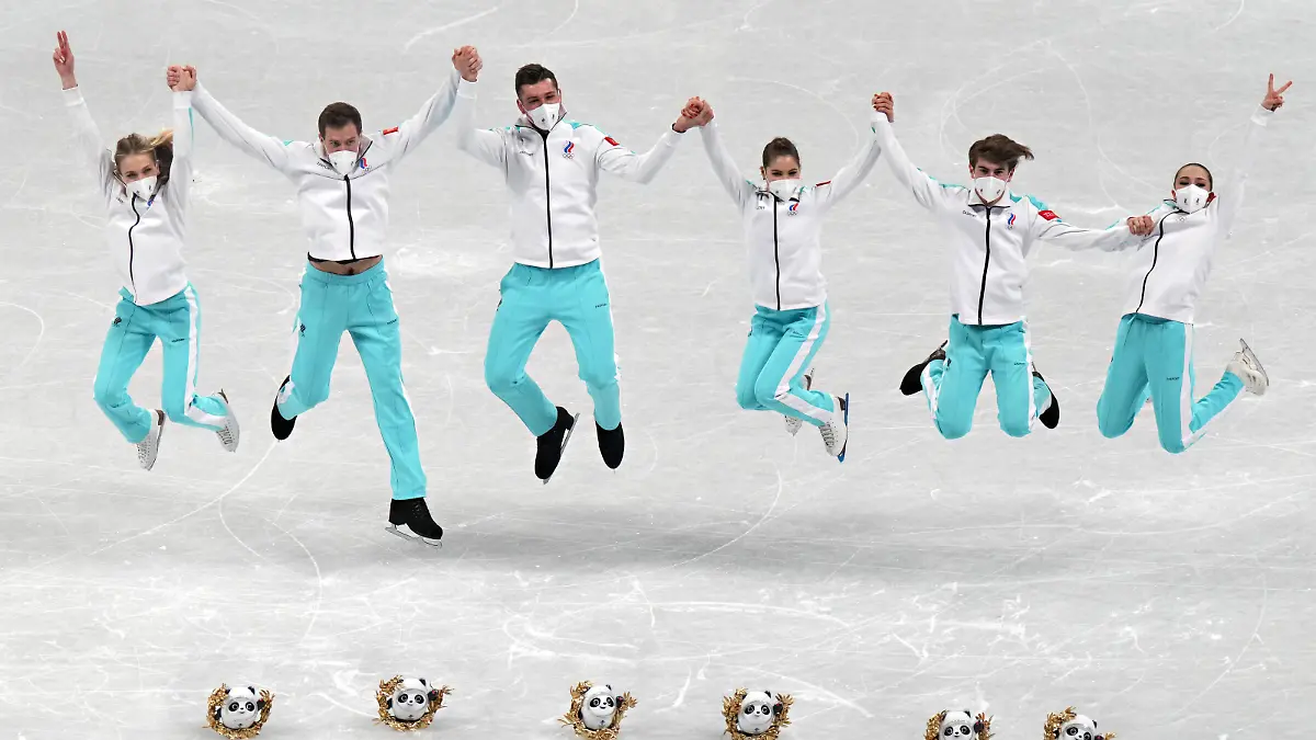 Members of the Russian Skating Team jump for a photos with the mascot dolls Bing Dwen Dwen after winning the gold medal in the Figure Skating Team Event at the Beijing 2022 Winter Olympics on Monday, February 7, 2022. Russia won the gold medal, USA the silver medal and Japan the bronze medal. Photo by Richard Ellis/UPI Photo via Newscom picture alliance
