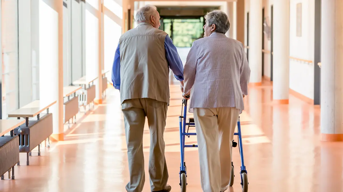 Senior couple with walking frame