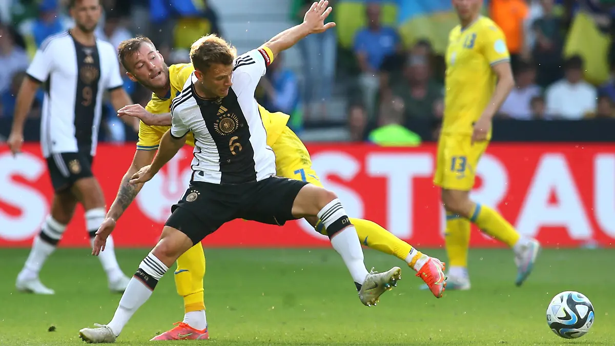 12.06.2023, xtgx, Fussball Länderspiel, Deutschland - Ukraine emspor, v.l. Andriy Yarmolenko Ukraine Joshua Kimmich Deutsche Fussball Nationalmannschaft DFB Zweikampf, Aktion, action, battle for the ball DFL/DFB REGULATIONS PROHIBIT ANY USE OF PHOTOGRAPHS as IMAGE SEQUENCES and/or QUASI-VIDEO Bremen *** 12 06 2023, xtgx, international football match, Germany Ukraine emspor, v l Andriy Yarmolenko Ukraine Joshua Kimmich German national football team DFB Zweikampf, action, battle for the ball DFL DFB REGULATES PROHIBIT ANY USE OF PHOTOGRAPHS AS IMAGE SEQUENCES AND OR QUASI VIDEO Bremen
