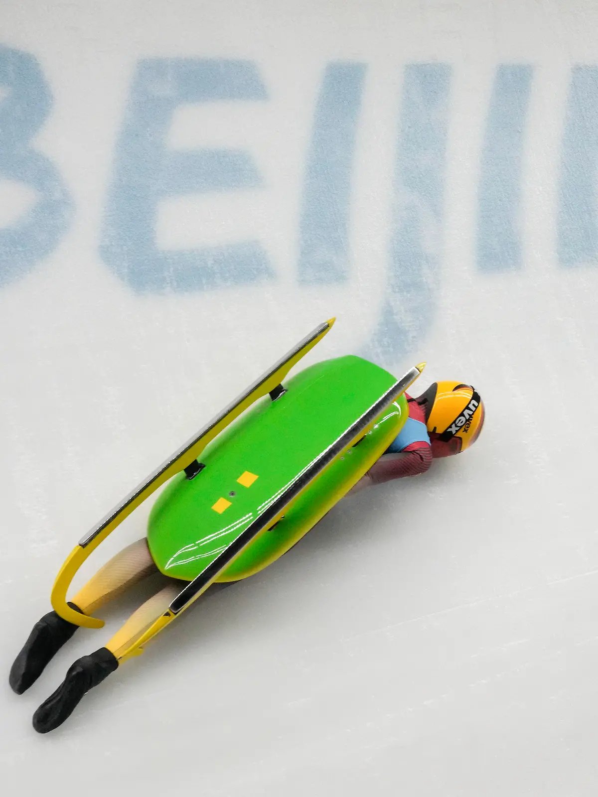 Julia Taubitz, of Germany, crashes during the luge women's singles run 2 at the 2022 Winter Olympics, Monday, Feb. 7, 2022, in the Yanqing district of Beijing. (AP Photo/Dmitri Lovetsky)