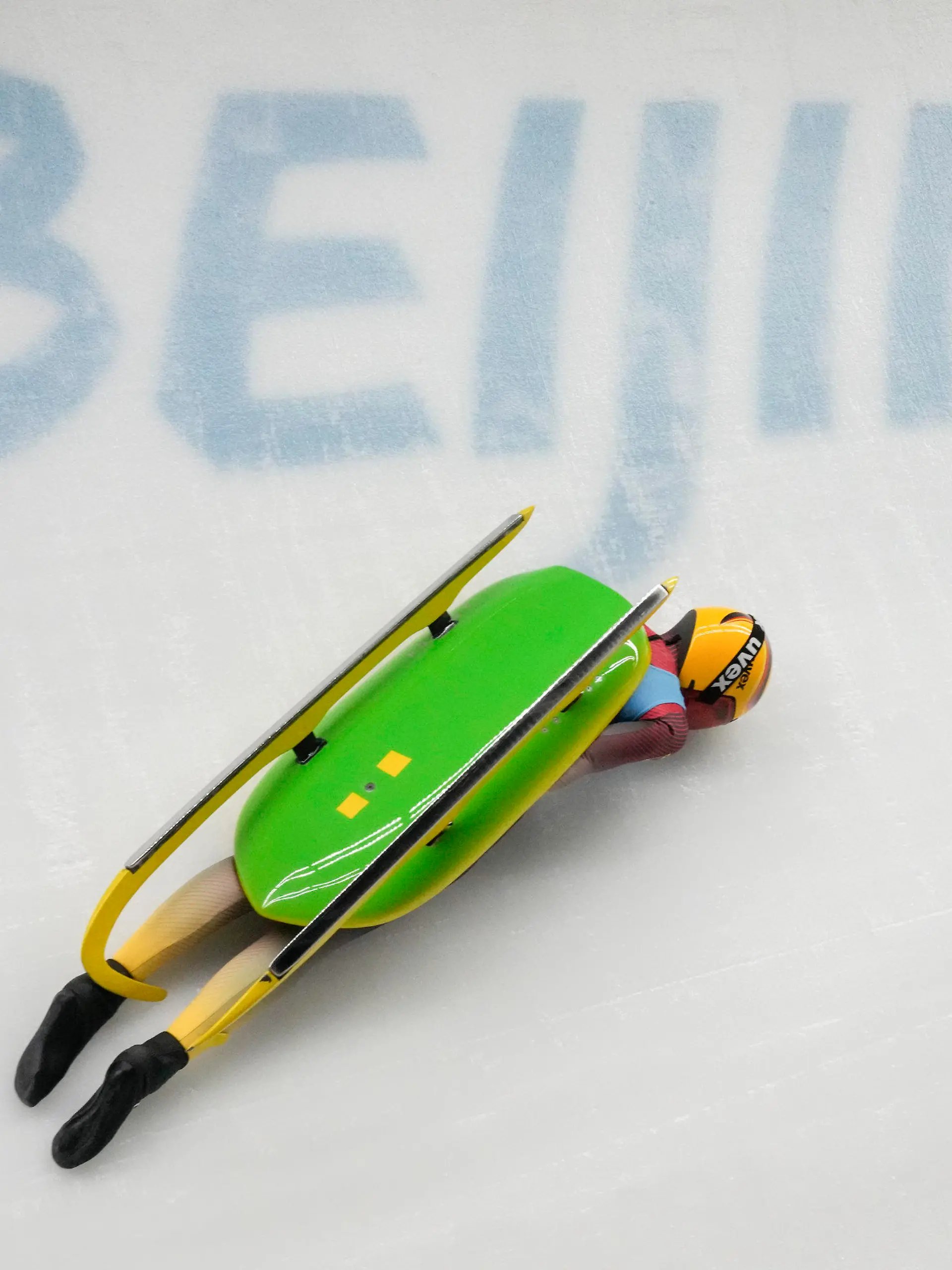 Julia Taubitz, of Germany, crashes during the luge women's singles run 2 at the 2022 Winter Olympics, Monday, Feb. 7, 2022, in the Yanqing district of Beijing. (AP Photo/Dmitri Lovetsky)