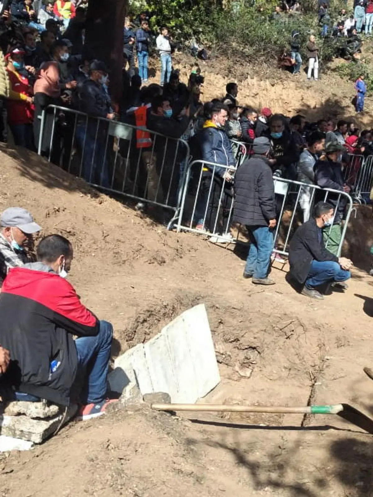 Mourners gather to pay their final respects to 5-year-old child, Rayan Awram, who died on Saturday after a days-long effort to rescue him from a well, during his funeral near Chefchaouen, Morocco February 7, 2022.  REUTERS/Chakir Lakhlifi  NO RESALES. NO ARCHIVES