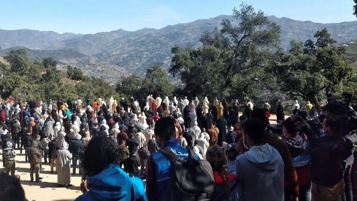 Mourners gather during the funeral of 5-year-old child, Rayan Awram, who died after being trapped in a well, near Chefchaouen, Morocco February 7, 2022. REUTERS/Chakir Lakhlifi NO RESALES. NO ARCHIVES
