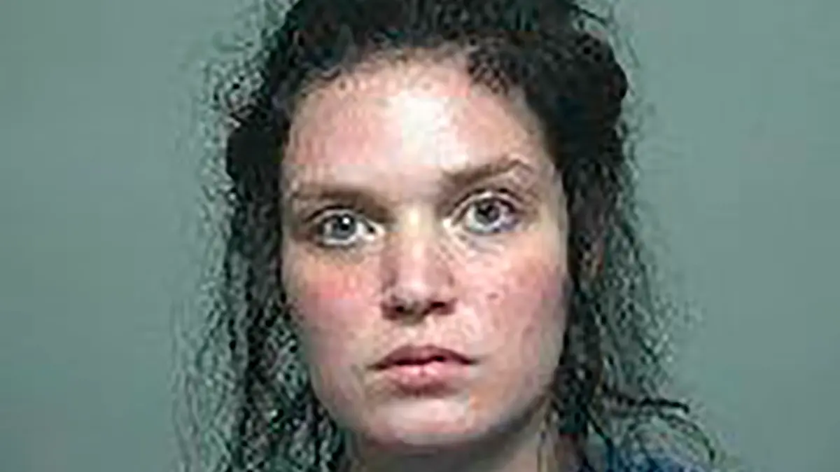 This undated photo provided by the Iosco County Sheriff's Office in Tawas City, Mich. shows Justine Johnson. Authorities have charged Johnson with murder days after her 3-year-old daughter's body was found with multiple stab wounds inside a garbage bag. Justine Johnson was arraigned Monday, Sept. 20, 2021, in 81st District Court in Tawas City, on one count each of felony murder and first-degree child abuse. (Iosco County Sheriff's Office via AP)