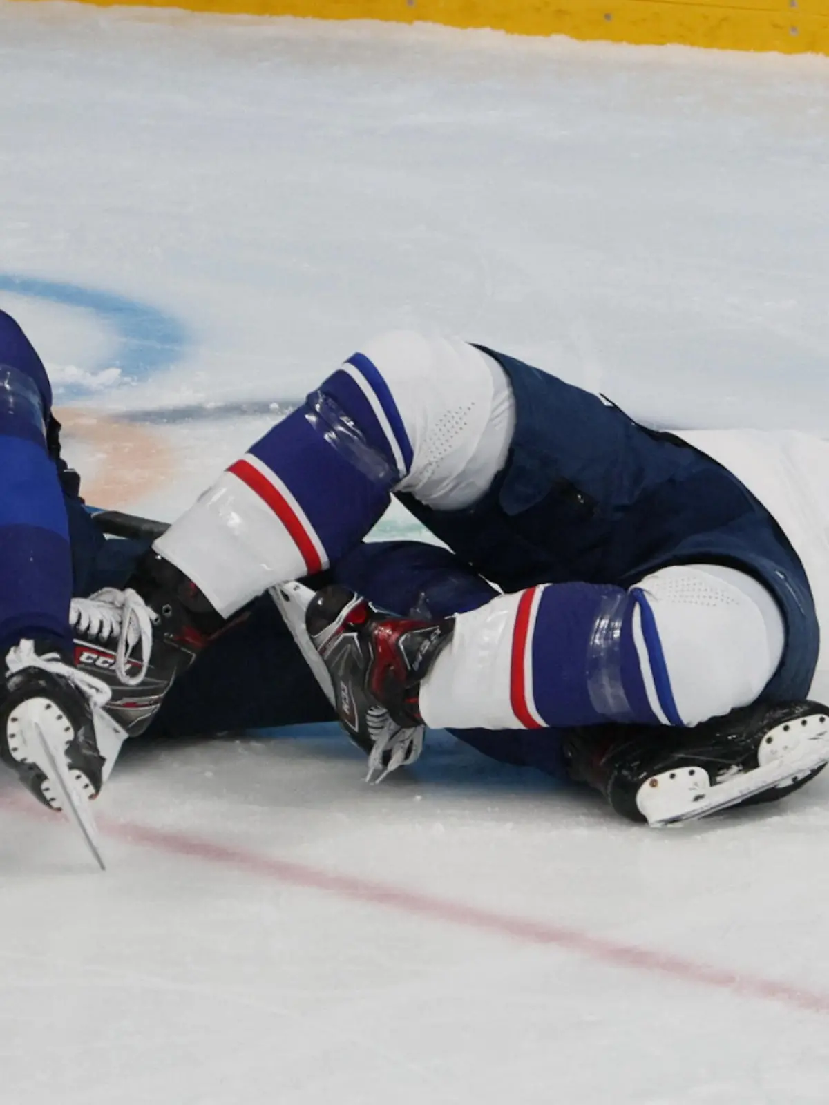 2022 Beijing Olympics - Ice Hockey - Women's Prelim. Round - Group A - Finland v United States - Wukesong Sports Centre, Beijing, China - February 3, 2022. Ronja Savolainen of Finland and Brianna Decker of United States clash. REUTERS/Brian Snyder