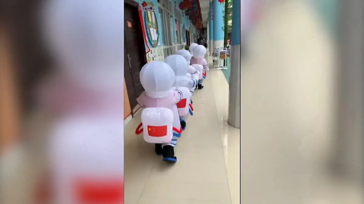 Image accompanying In China dürfen Kinder nur in den Kindergarten wenn sie Schutzanzüge tragen