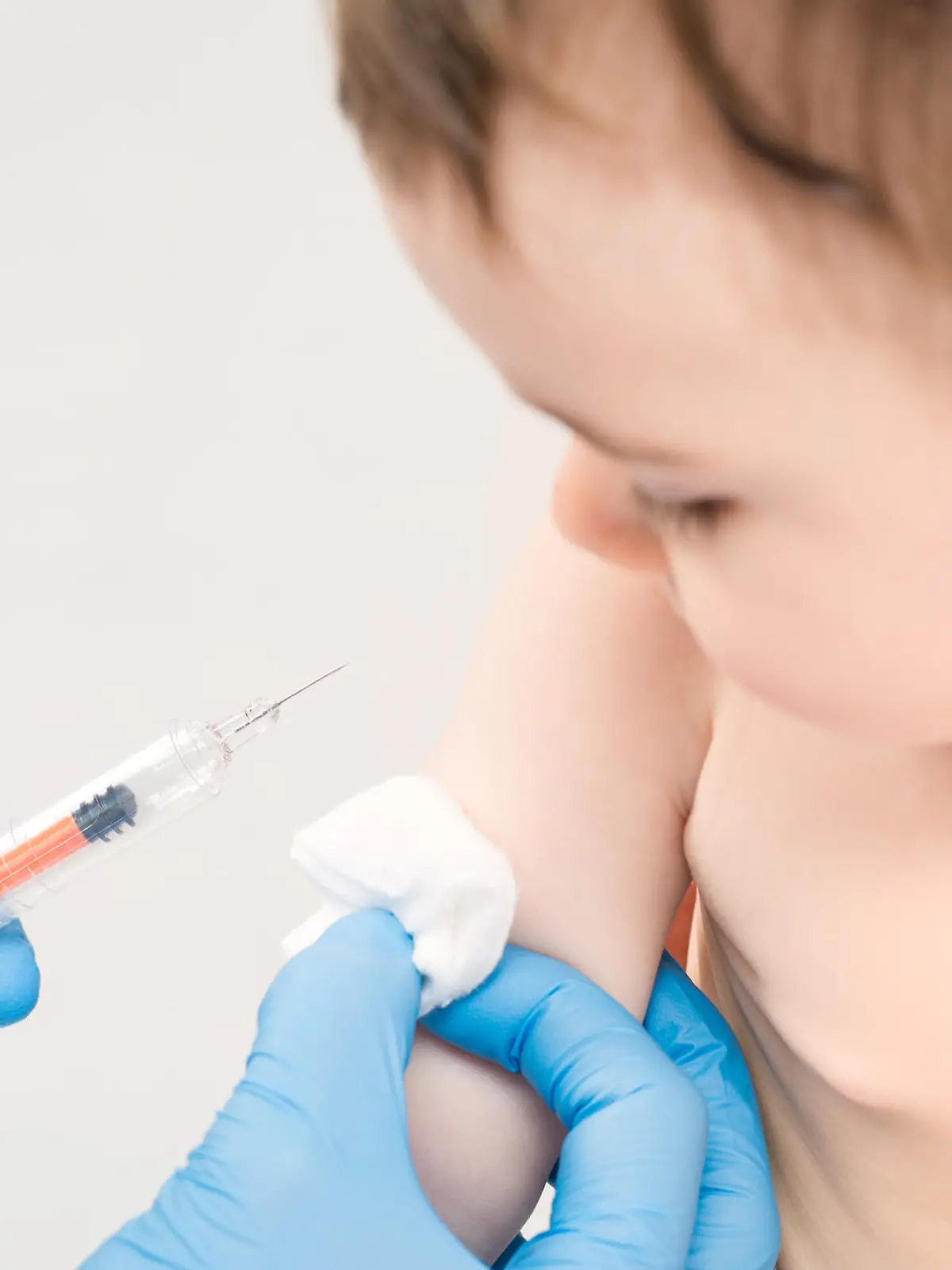 vaccine vaccination child baby doctor injection pediatrician injecting arm health immunization hand hospital needle syringe concept - stock image