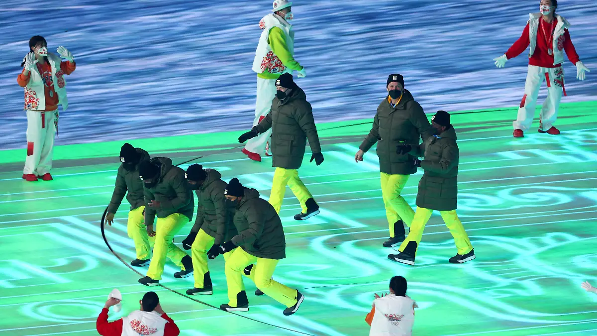 BEIJING, CHINA - FEBRUARY 04: Members of Team Jamaica during the Opening Ceremony of the Beijing 2022 Winter Olympics at the Beijing National Stadium on February 04, 2022 in Beijing, China. (Photo by Elsa/Getty Images)
