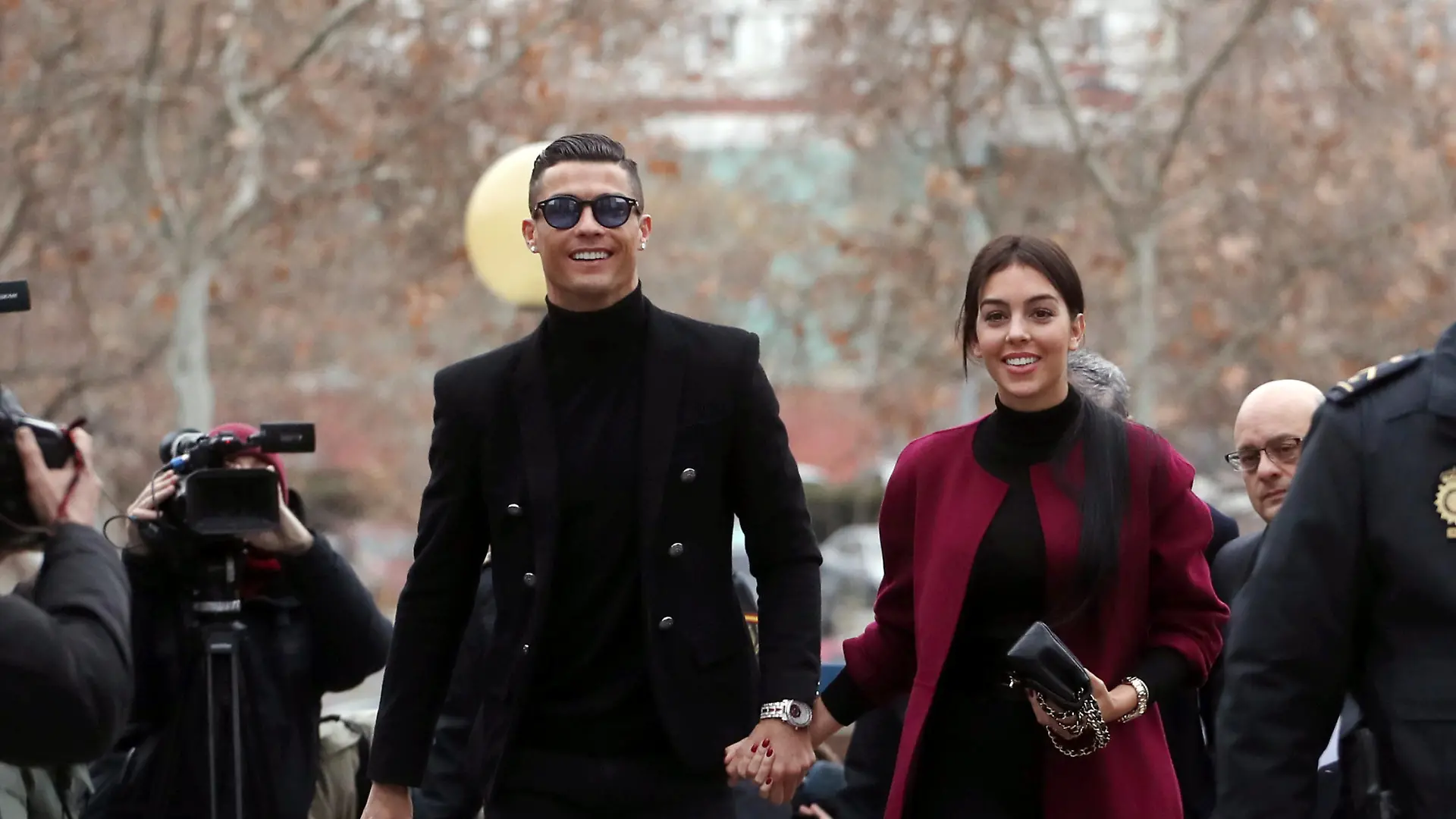 Portugal's soccer player Cristiano Ronaldo arrives with his girlfriend Georgina Rodriguez to appear in court on a trial for tax fraud in Madrid, Spain, January 22, 2019. REUTERS/Susana Vera