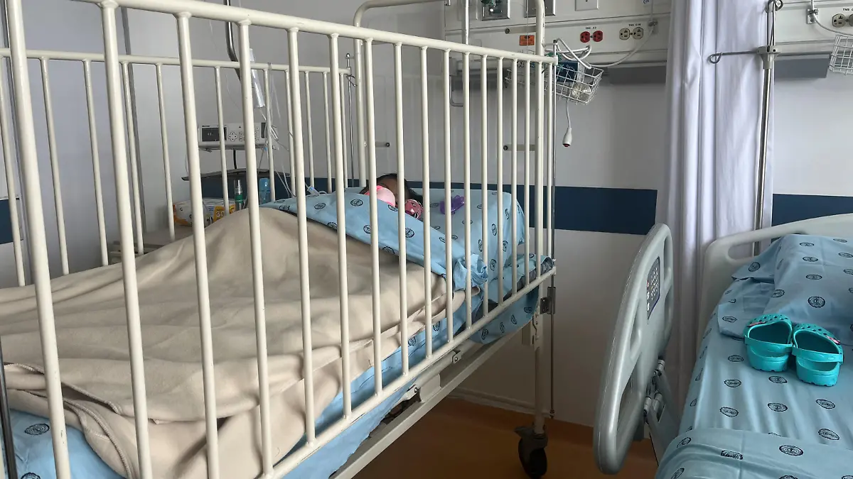 One of the child survivors of a Cessna 206 plane that crashed in thick jungle is seen at the central military hospital, in Bogota, June 10, 2023. Colombian Presidency/Handout via REUTERS ATTENTION EDITORS - THIS IMAGE WAS PROVIDED BY A THIRD PARTY. MANDATORY CREDIT. NO RESALES. NO ARCHIVES