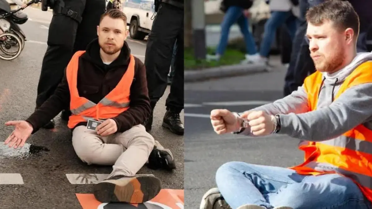 Moritz Riedacher sitzt in orangener Warnweste auf der Straße