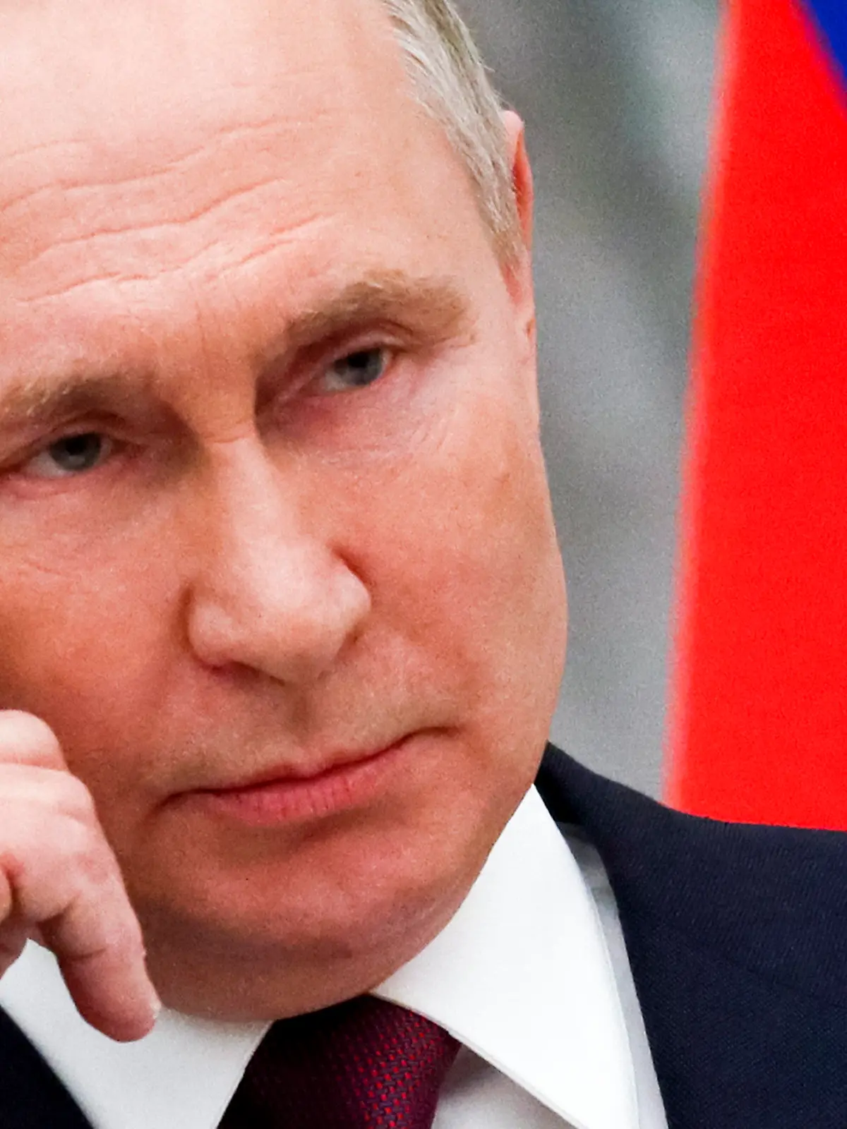 Russian President Vladimir Putin listens to a journalist's question during a joint news conference with Hungary's Prime Minister Viktor Orban following their talks in the Kremlin in Moscow, Russia, Tuesday, Feb. 1, 2022. Putin says the U.S. and its allies have ignored Russia's top security demands. In his first comments on the standoff with the West over Ukraine in more than a month, Putin said Tuesday that the Kremlin is still studying the U.S. and NATO's response to the Russian security demands received last week. (Yuri Kochetkov/Pool Photo via AP)