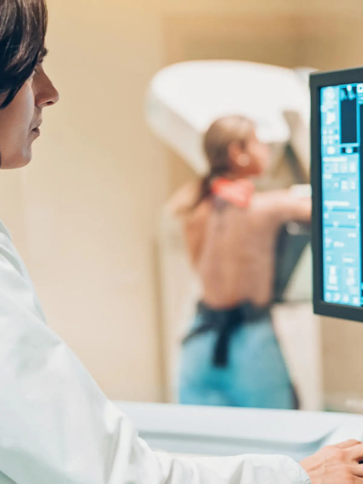 Doctor and patient making a mammography