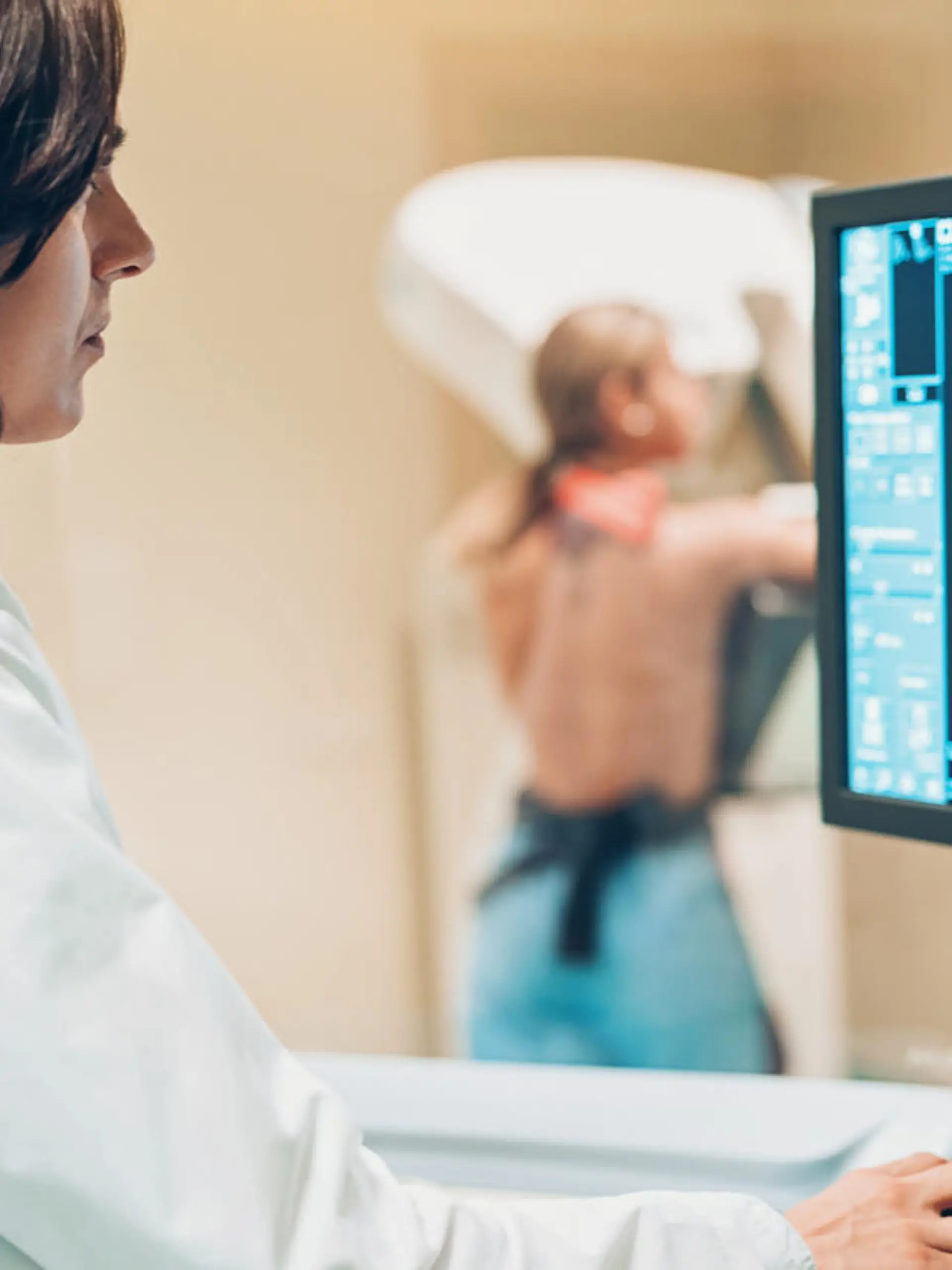 Doctor and patient making a mammography